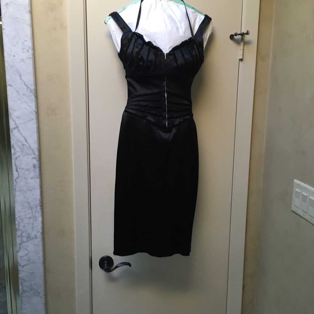 Like new. Stunning cocktail dress!